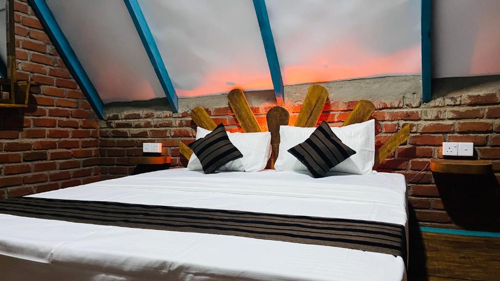 Postel nebo postele na pokoji v ubytování Ali Adi Eco Resort