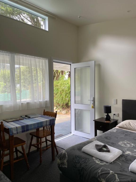Postel nebo postele na pokoji v ubytování Mataki Motel