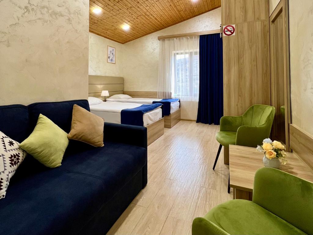 Postel nebo postele na pokoji v ubytování DiliVita Rest House