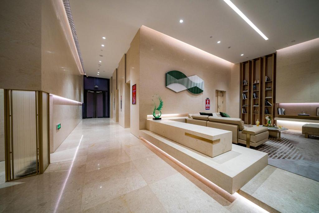 Posezení v ubytování Yomanjoo City View Hotel - Shenzhen Nanshan Coastal City Flagship Store