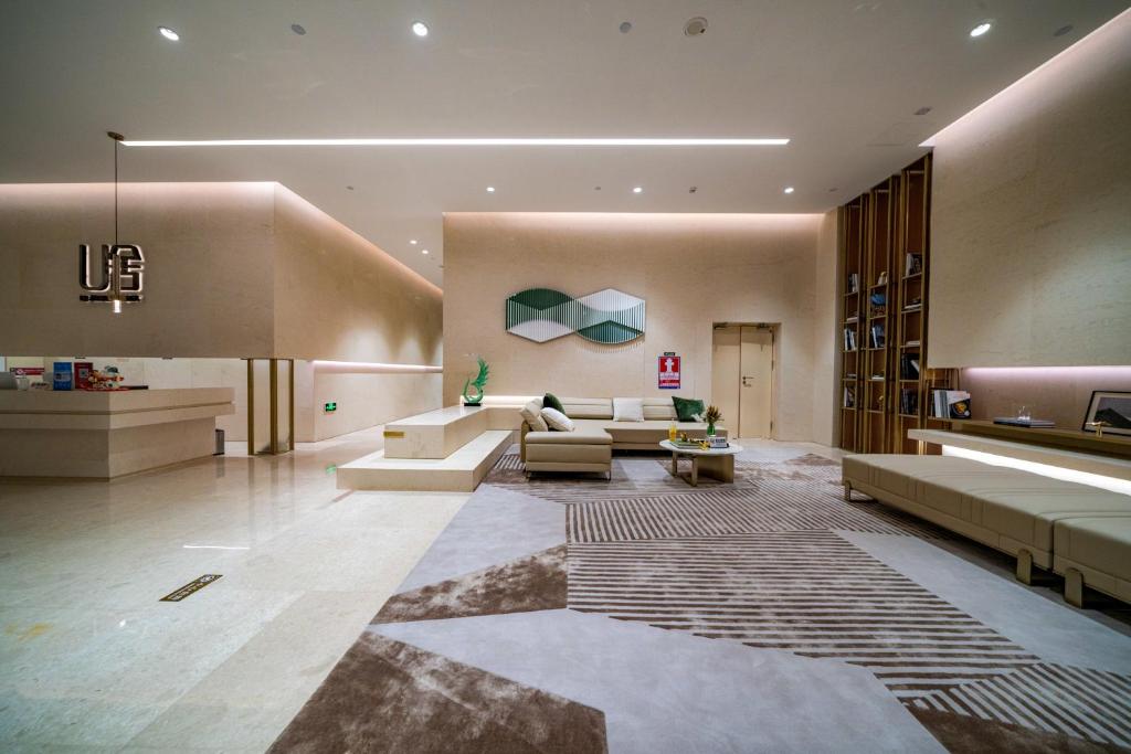 Posezení v ubytování Yomanjoo City View Hotel - Shenzhen Nanshan Coastal City Flagship Store