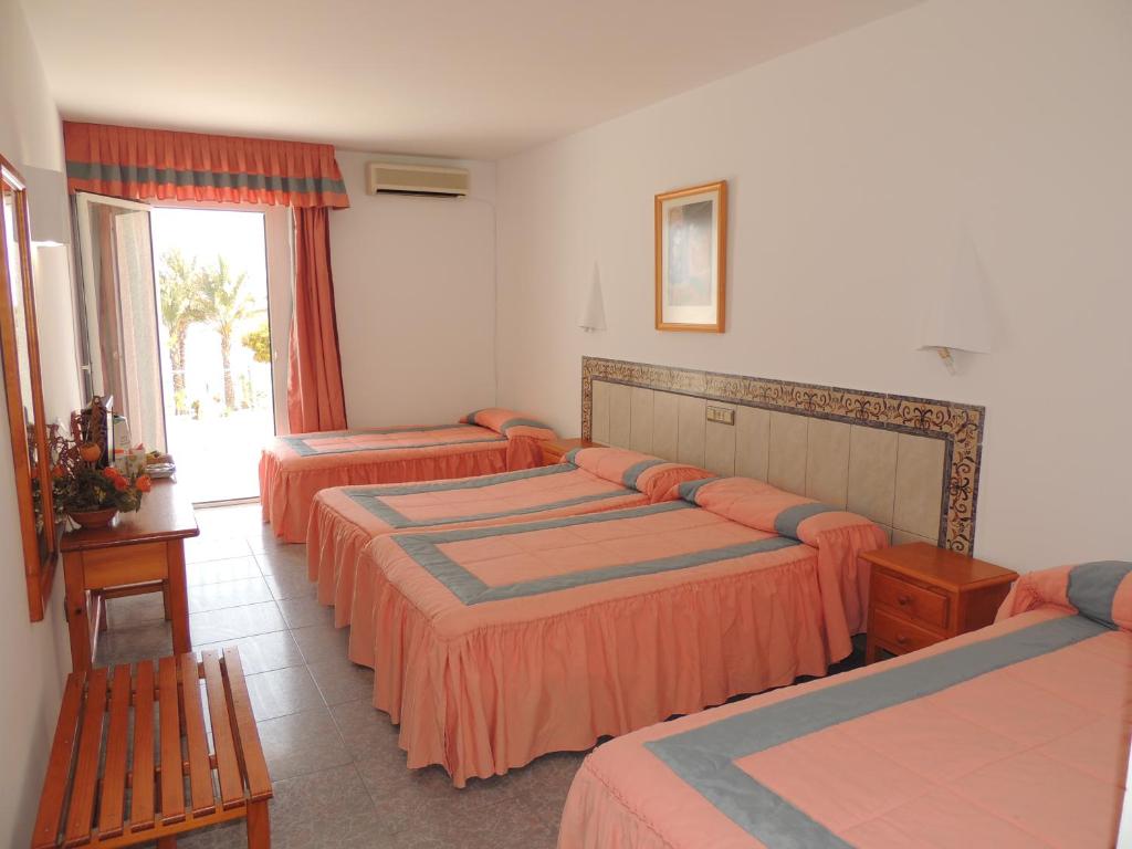 Postel nebo postele na pokoji v ubytování Virgen del Mar Holidays