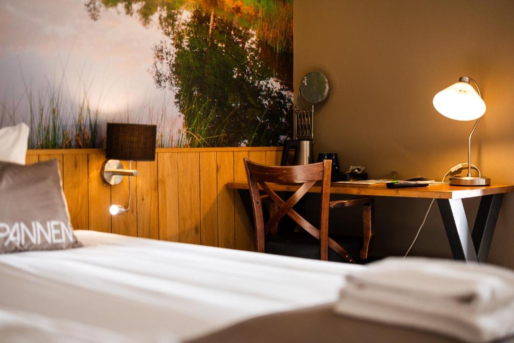 Postel nebo postele na pokoji v ubytování Hotel Restaurant 'de Vossenberg'
