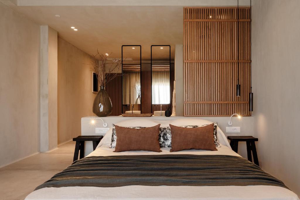 Postel nebo postele na pokoji v ubytování Tesoro Elegant escapes- suites