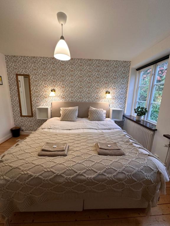 Postel nebo postele na pokoji v ubytování Minnesberg Bed & Breakfast