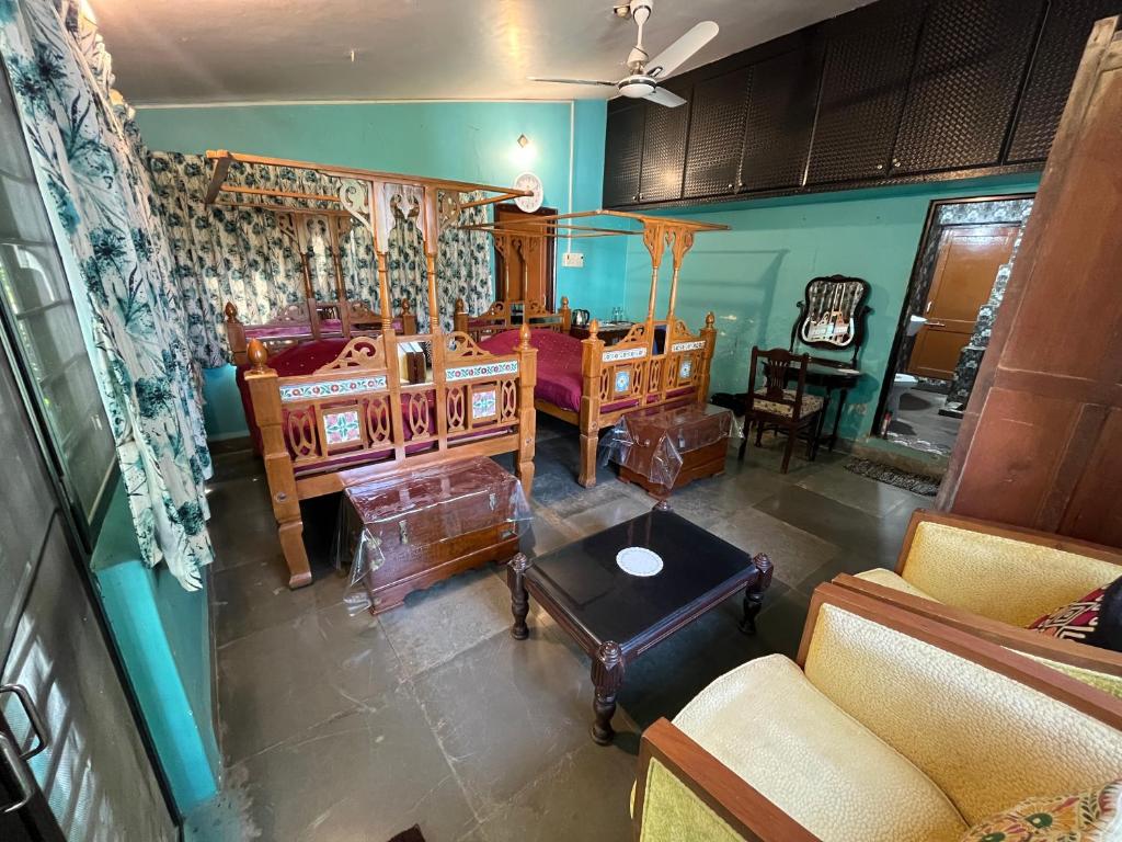 Kuchyň nebo kuchyňský kout v ubytování Sharad Baug homestay