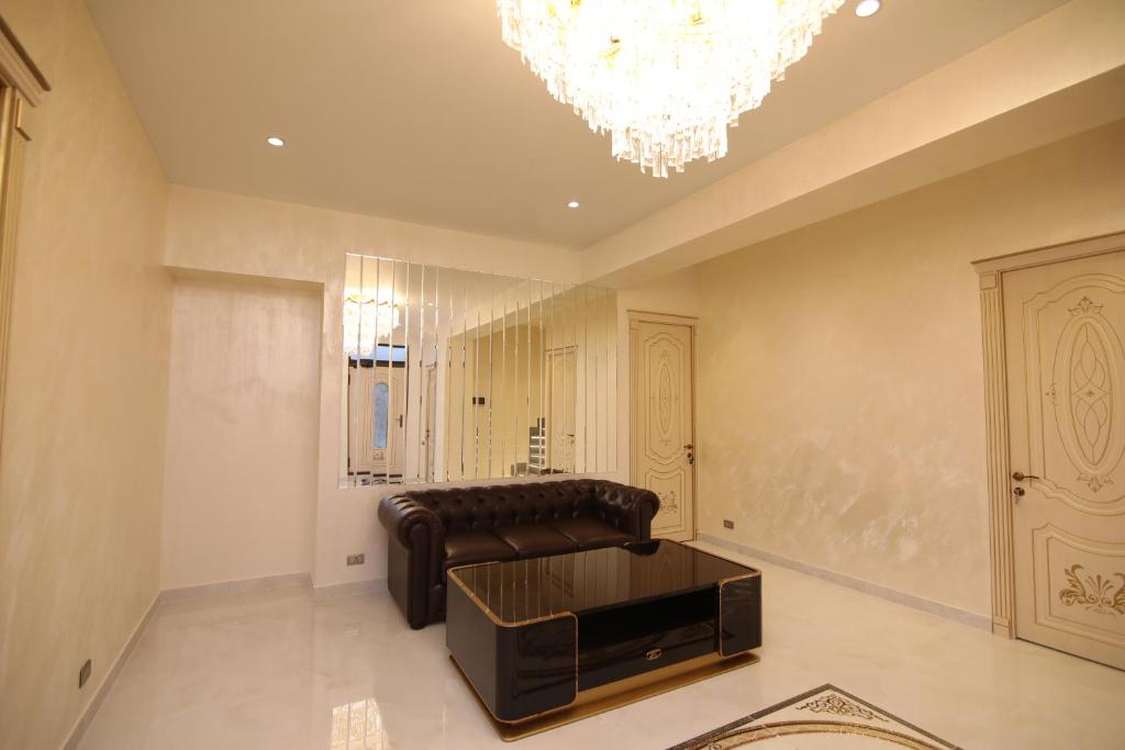 Posezení v ubytování Louvre Luxury Collection Hotel