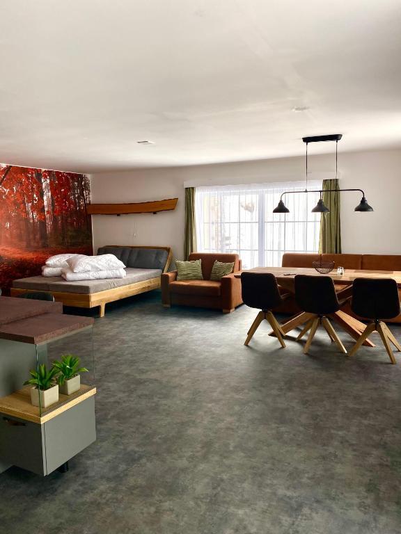 Postel nebo postele na pokoji v ubytování Apartmán pod Dubem