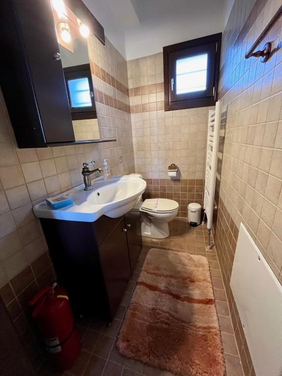 Koupelna v ubytování Stone Villa Rokosini