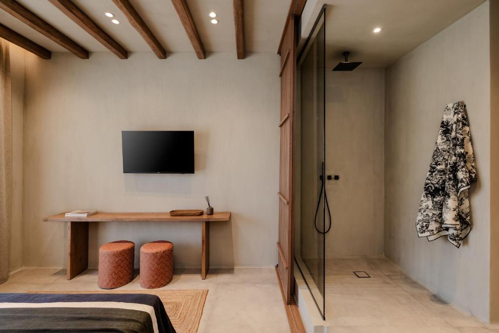 TV a/nebo společenská místnost v ubytování Tesoro Elegant escapes- suites