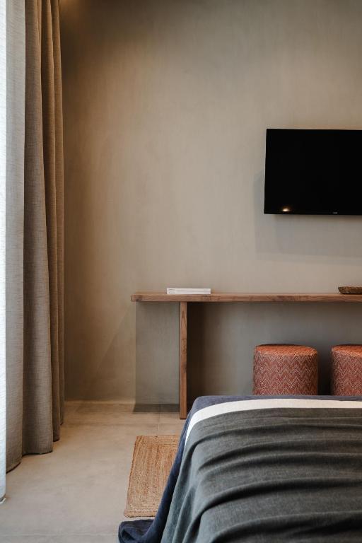 TV a/nebo společenská místnost v ubytování Tesoro Elegant escapes- suites