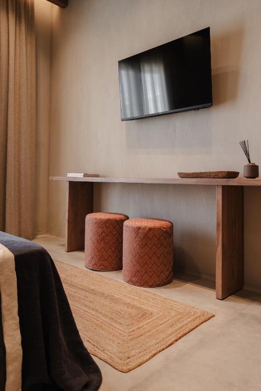 TV a/nebo společenská místnost v ubytování Tesoro Elegant escapes- suites
