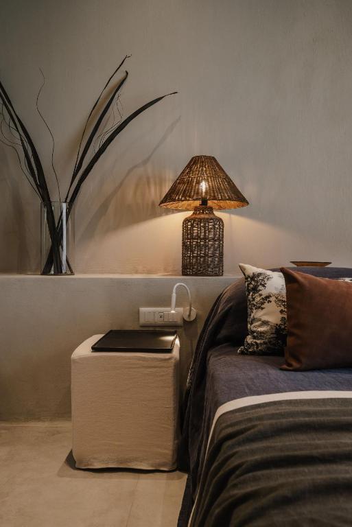 Postel nebo postele na pokoji v ubytování Tesoro Elegant escapes- suites