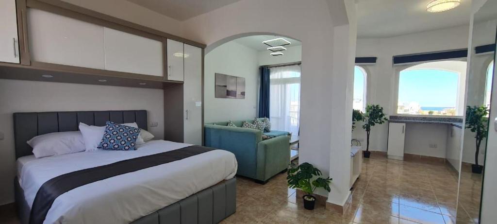 Ένα ή περισσότερα κρεβάτια σε δωμάτιο στο Beautiful Apartment in Egyptian Experience Resort