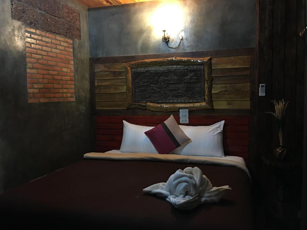 Postel nebo postele na pokoji v ubytování Sea Rock Resort