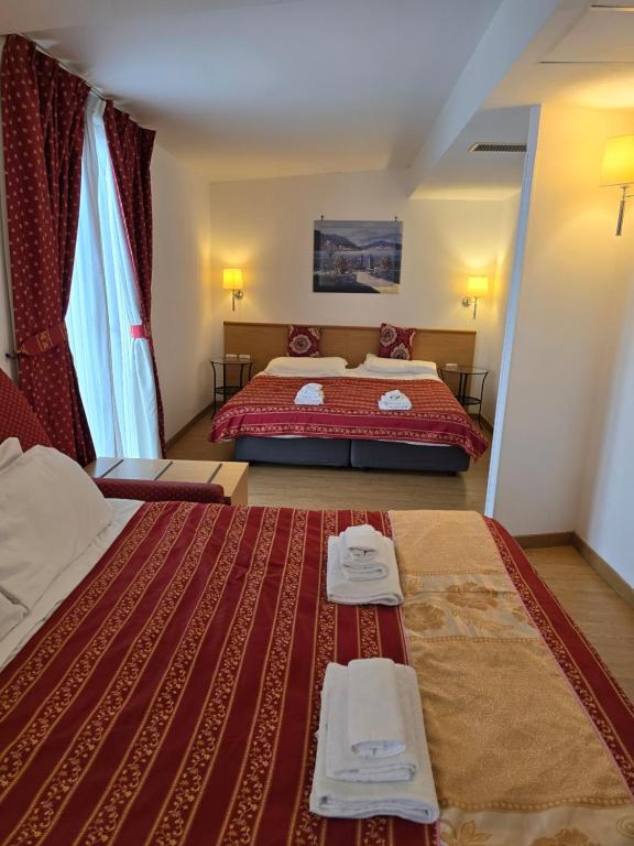 Postel nebo postele na pokoji v ubytování Hotel Marco Polo Airport hotel