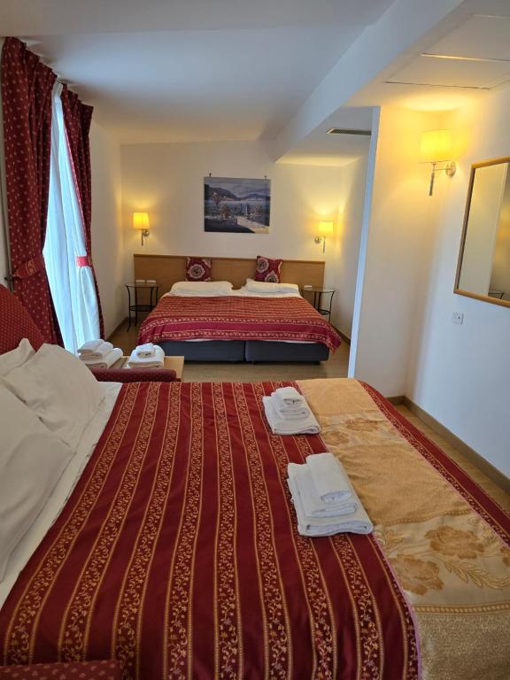 Postel nebo postele na pokoji v ubytování Hotel Marco Polo Airport hotel