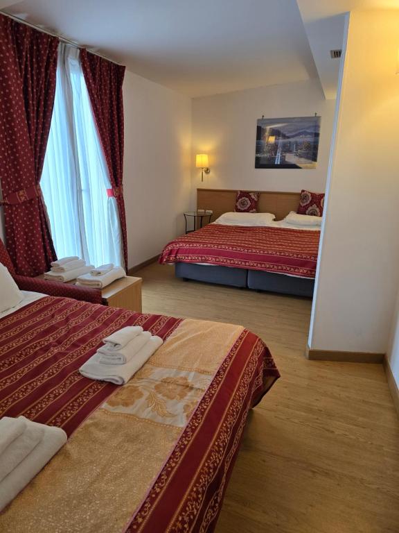 Postel nebo postele na pokoji v ubytování Hotel Marco Polo Airport hotel
