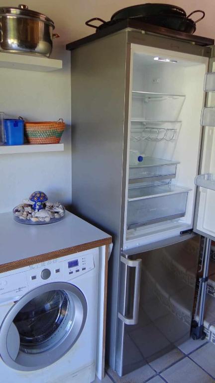 Kuchyň nebo kuchyňský kout v ubytování Casa Rural en Lira para 9 personas