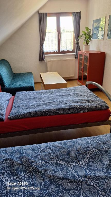 Postel nebo postele na pokoji v ubytování Pension Egida