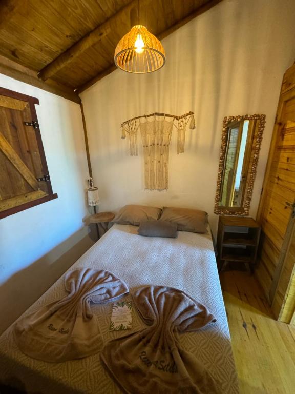 Postel nebo postele na pokoji v ubytování Pousada Reserva Setiba Guarapari