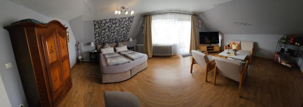 TV a/nebo společenská místnost v ubytování Ferienwohnung Prinz