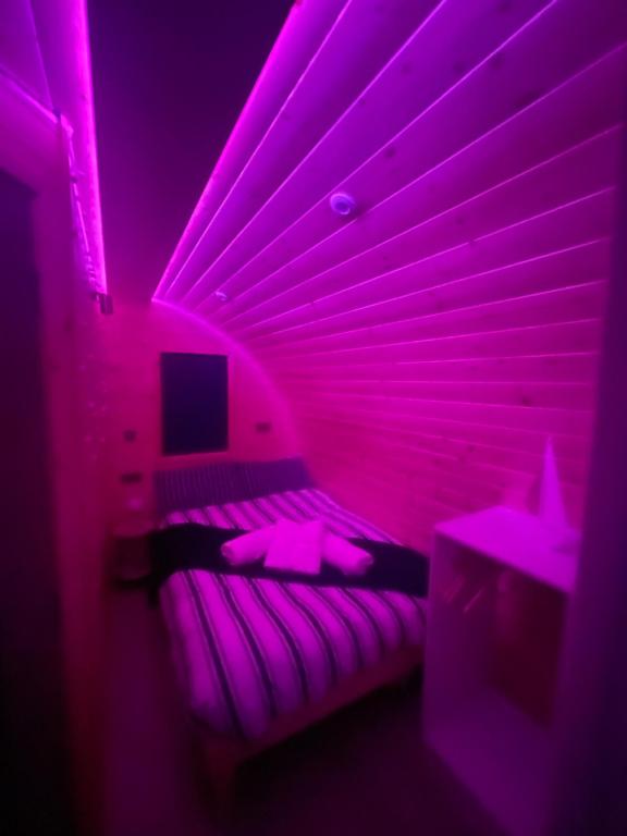 Letto o letti in una camera di Tra na Mbó Glamping Pod