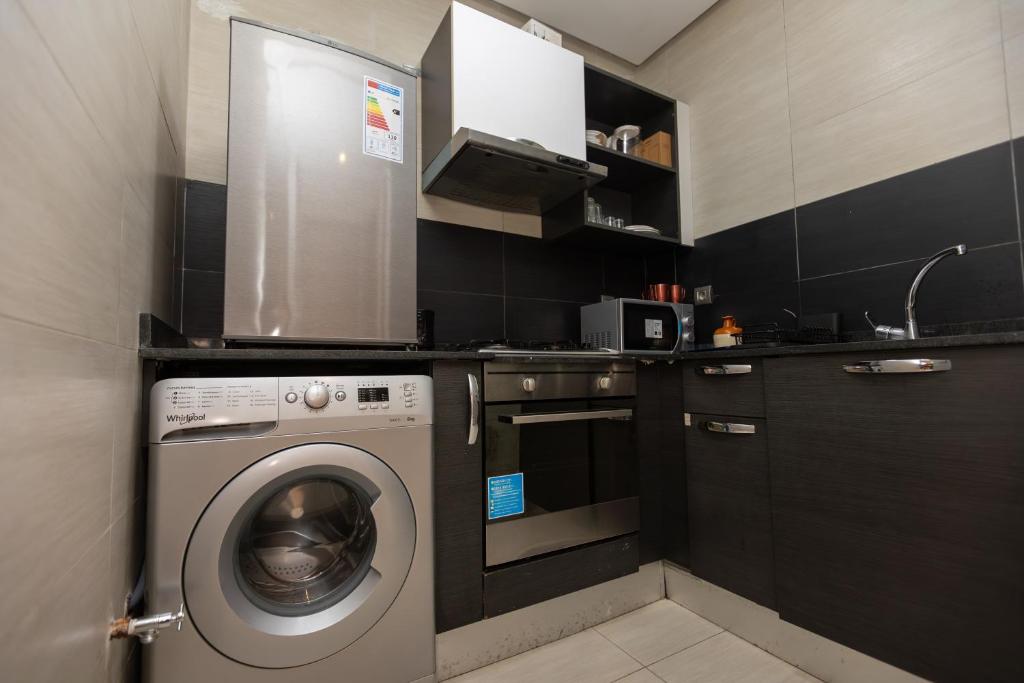 Kuchyň nebo kuchyňský kout v ubytování Prestigia Luxe Suite