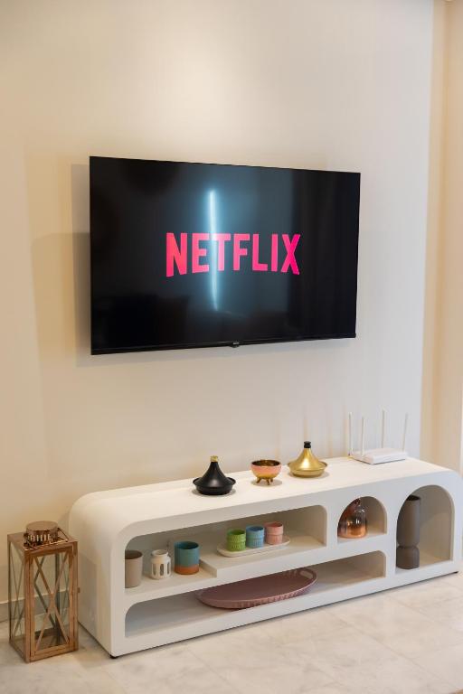 TV a/nebo společenská místnost v ubytování Prestigia Luxe Suite