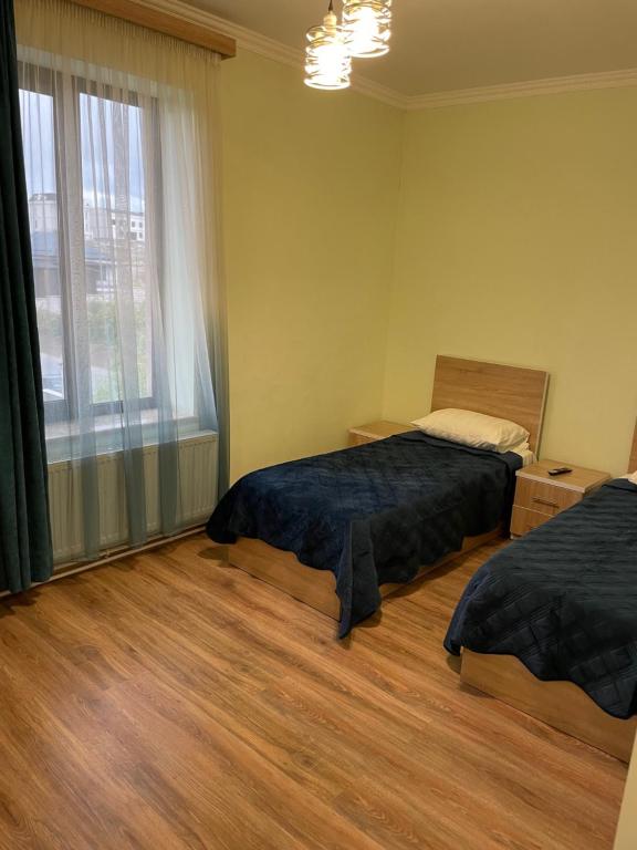 Postel nebo postele na pokoji v ubytování DECCA Hotel