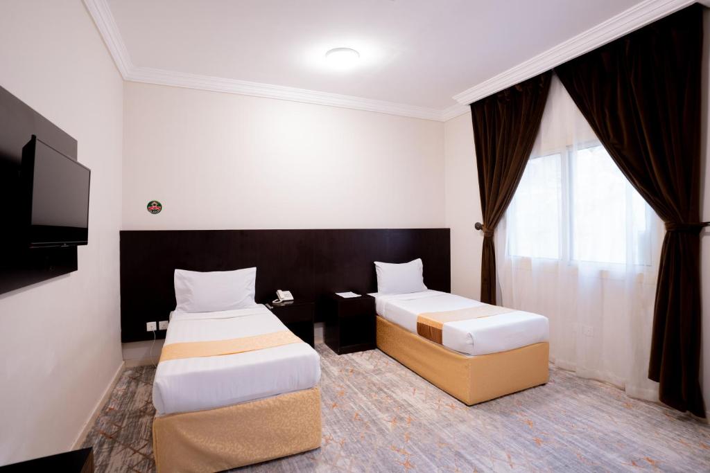 Postel nebo postele na pokoji v ubytování فندق سيف بلص 2