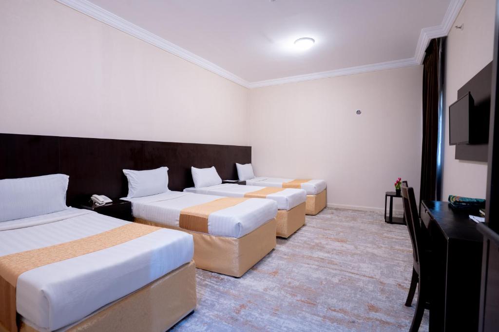 Postel nebo postele na pokoji v ubytování فندق سيف بلص 2