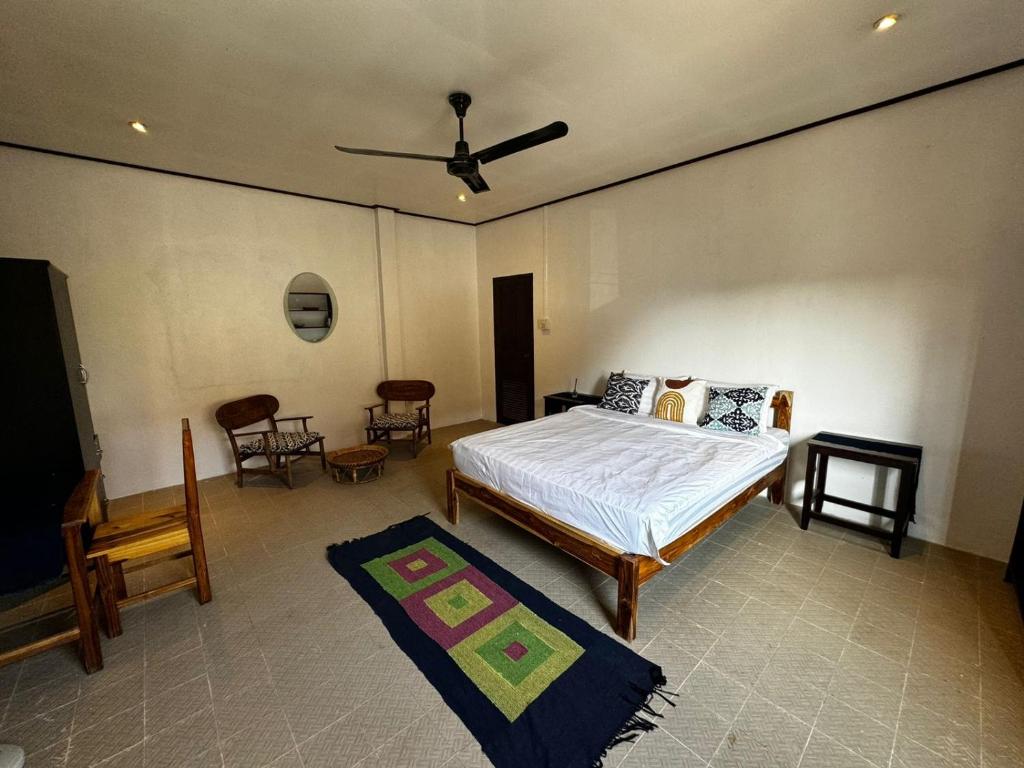 Ένα ή περισσότερα κρεβάτια σε δωμάτιο στο A bedroom in a local area