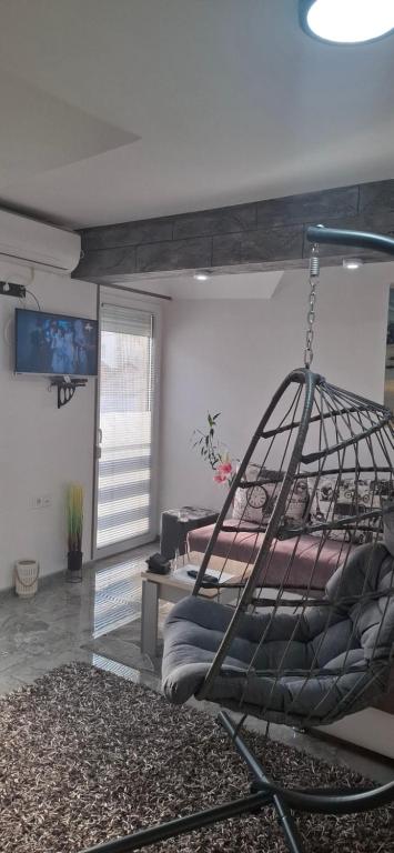 Postel nebo postele na pokoji v ubytování APARTMENTS IVANOViC CENTER CITY