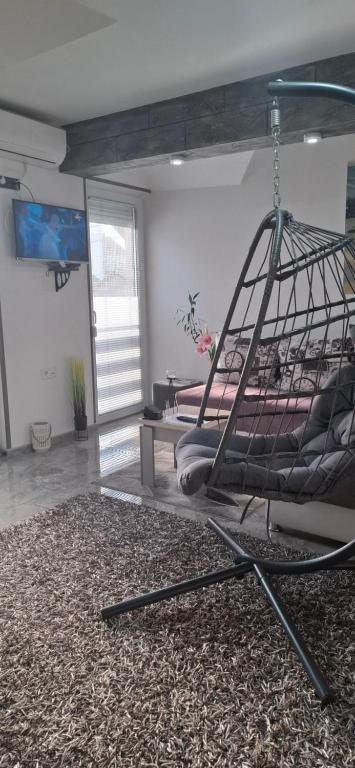 Postel nebo postele na pokoji v ubytování APARTMENTS IVANOViC CENTER CITY
