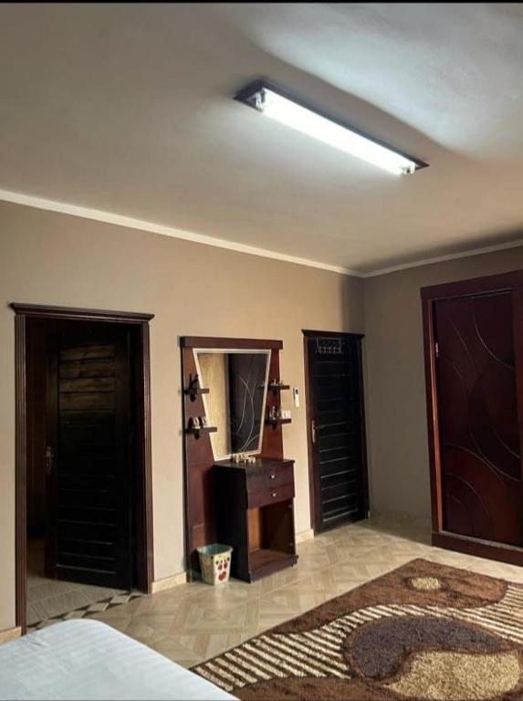 Postel nebo postele na pokoji v ubytování Aoda pyramids