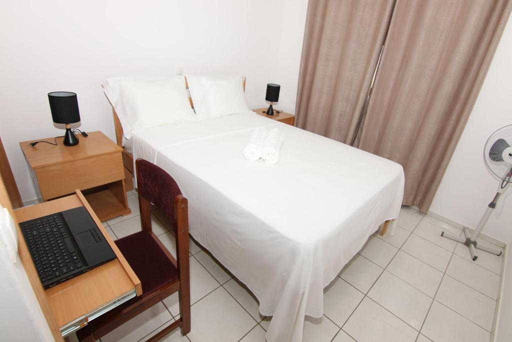 Postel nebo postele na pokoji v ubytování Kasa Tabuga