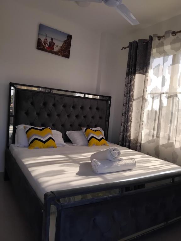 Postel nebo postele na pokoji v ubytování Zippy’s home