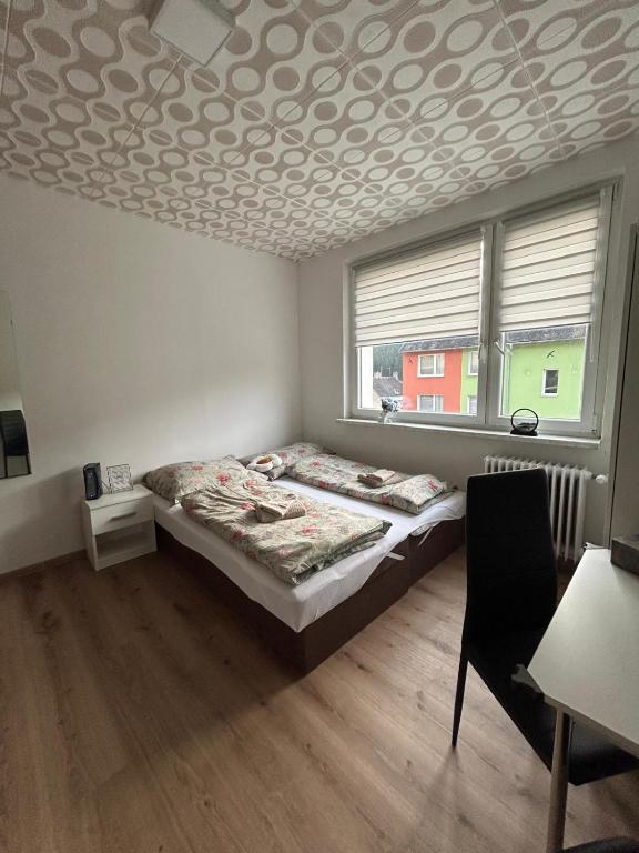 Postel nebo postele na pokoji v ubytování Apartmán ve městě Pernink pro 2 osoby
