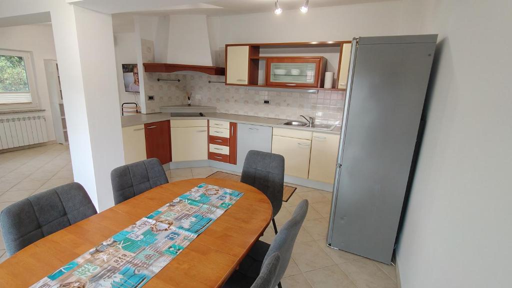 Kuchyň nebo kuchyňský kout v ubytování Apartma Apollonio