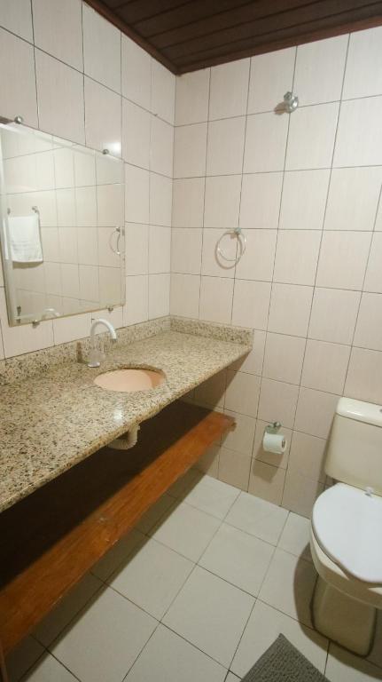 Koupelna v ubytování Sky Suites Pousada