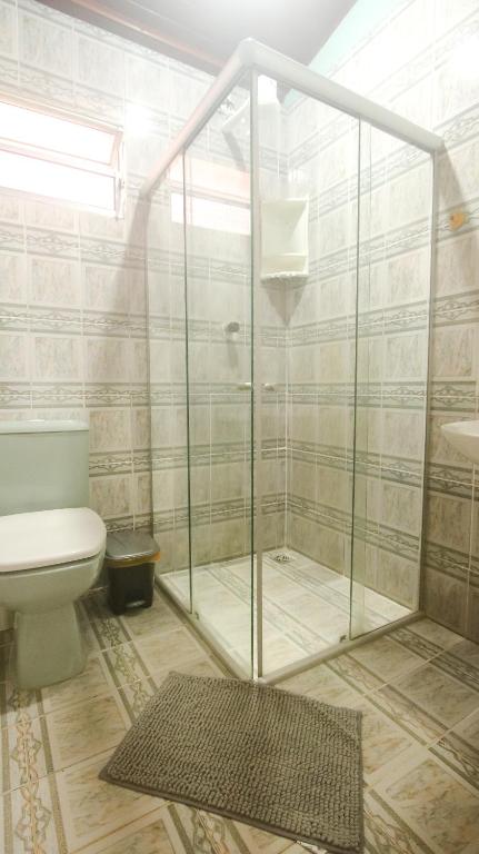 Koupelna v ubytování Sky Suites Pousada