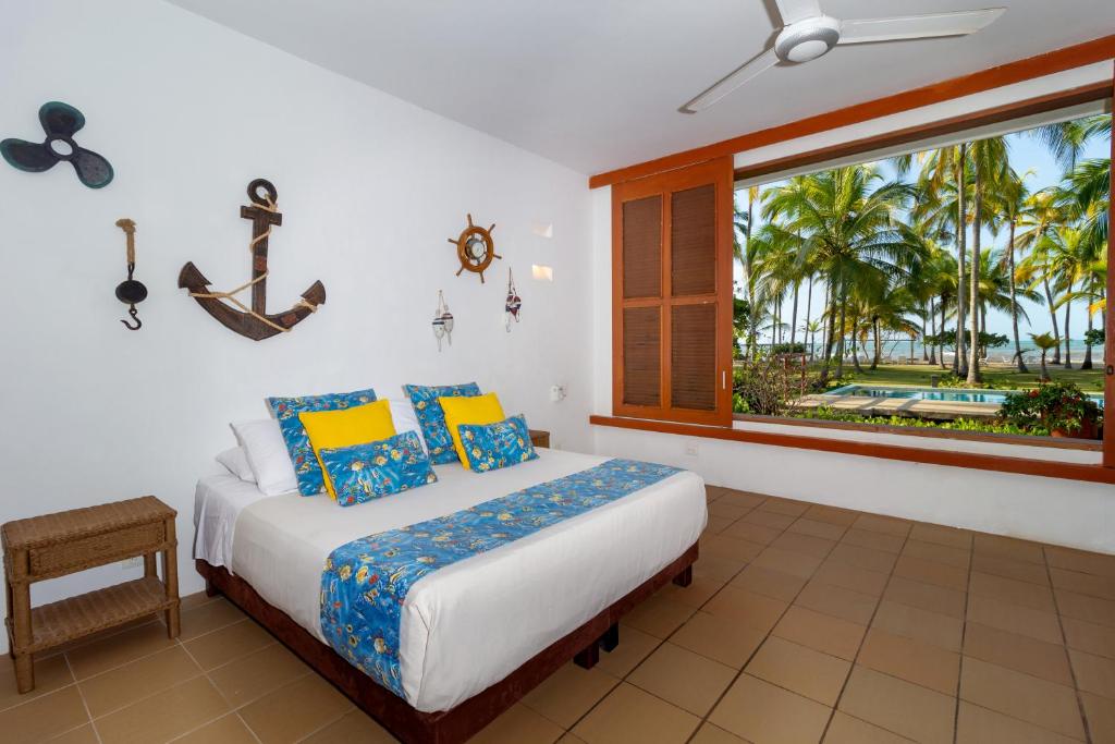 Una cama o camas en una habitación de Hotel Chiniu