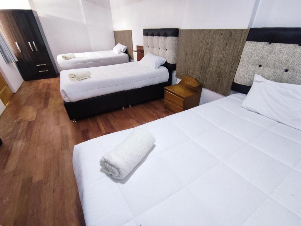 Ένα ή περισσότερα κρεβάτια σε δωμάτιο στο Anata Hotel