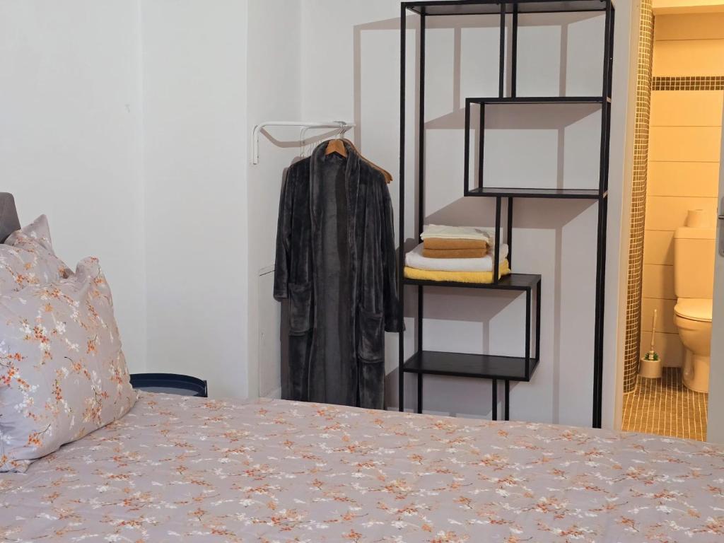 Postel nebo postele na pokoji v ubytování Babylone