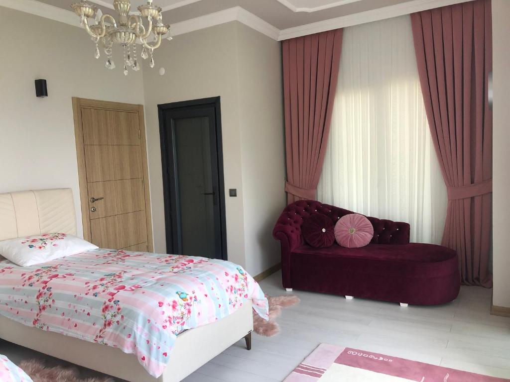 A bed or beds in a room at Çolakoglu konagı