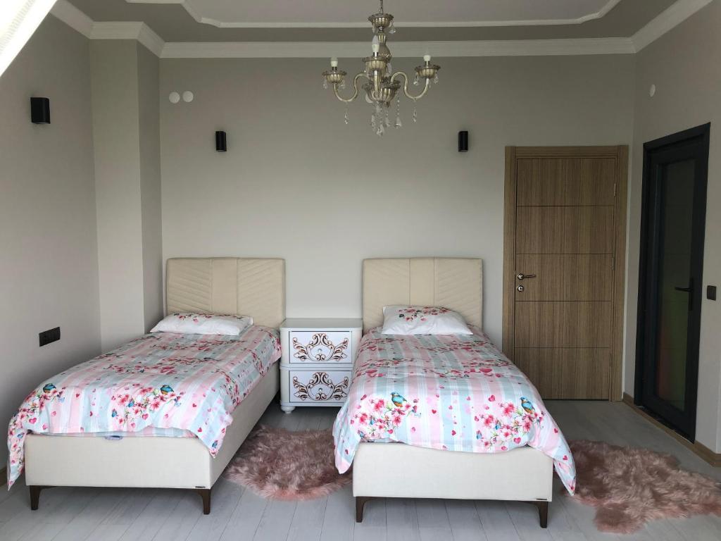 A bed or beds in a room at Çolakoglu konagı
