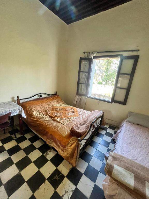 Postel nebo postele na pokoji v ubytování HOTEL DU PARq