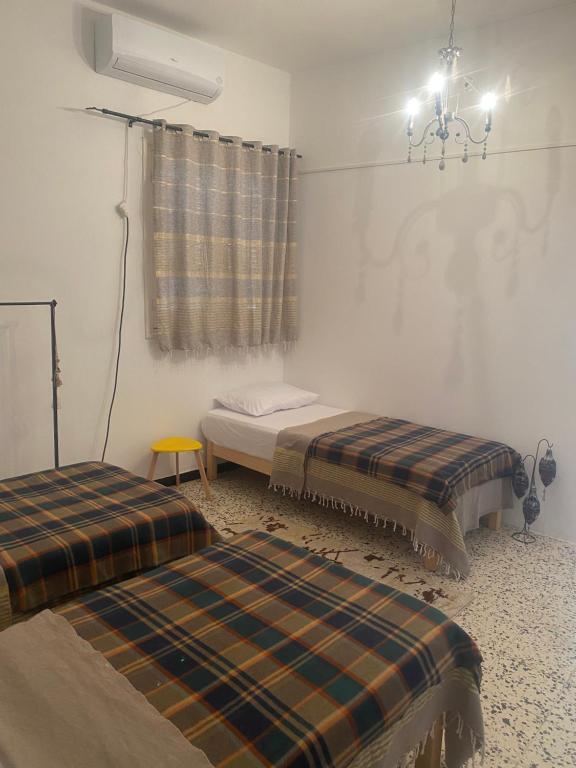 Postelja oz. postelje v sobi nastanitve Studio CoCoti