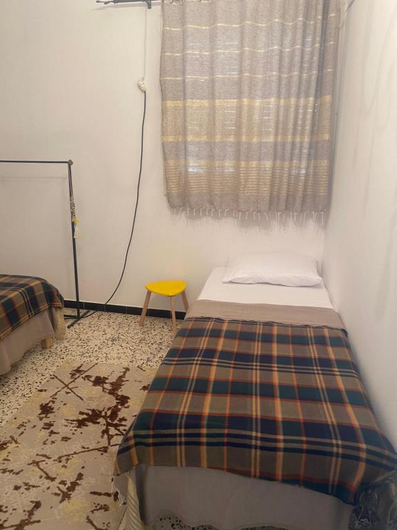Postelja oz. postelje v sobi nastanitve Studio CoCoti